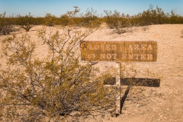 The area around the ruins are closed to the public. Remains of other structures are buried and preserved in the sand. No digging is permitted.